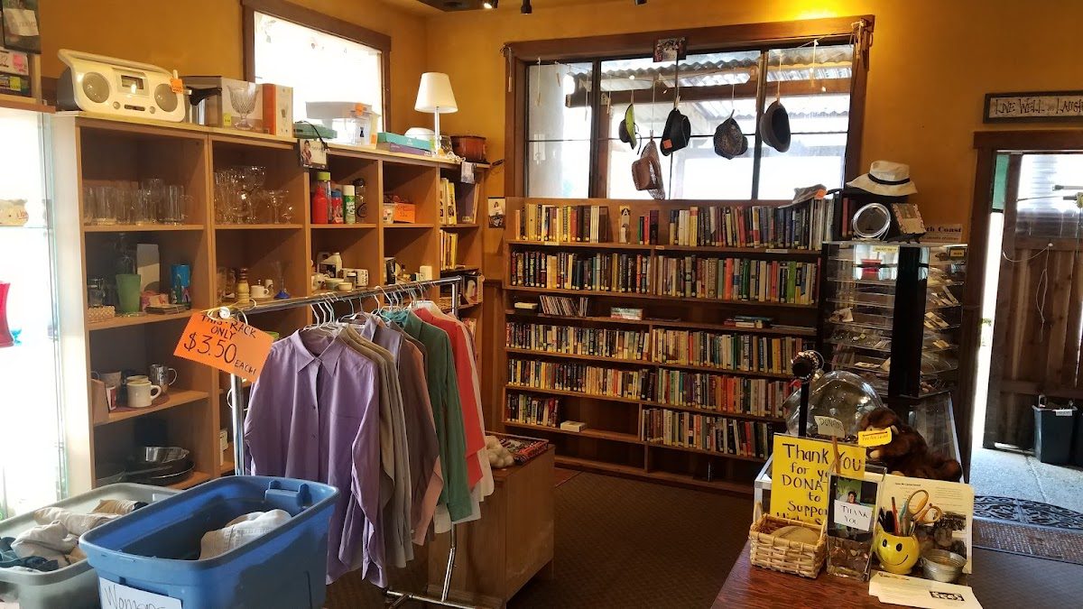 Books and clothing on the shelves