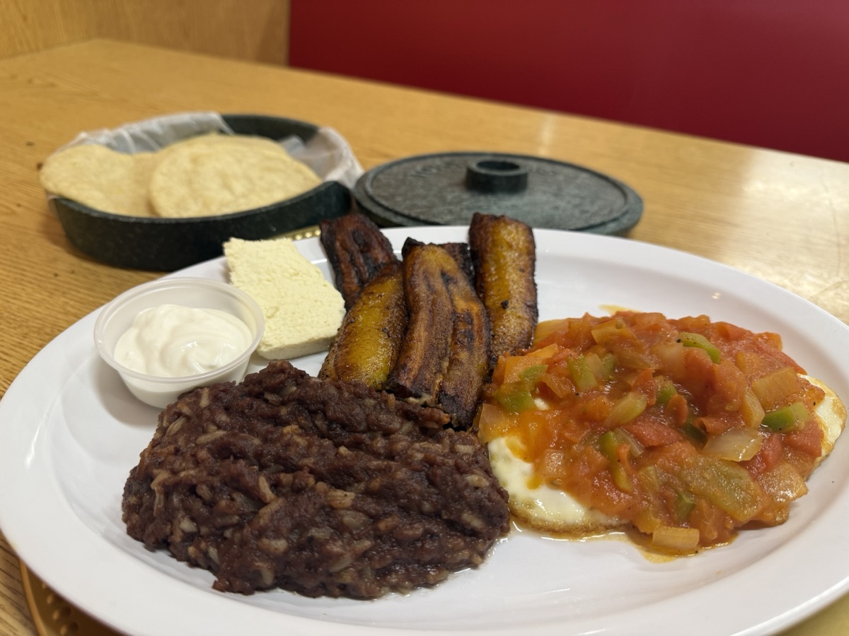 Desayuno Salvadoreño — eggs, beans, plantains, queso fresco