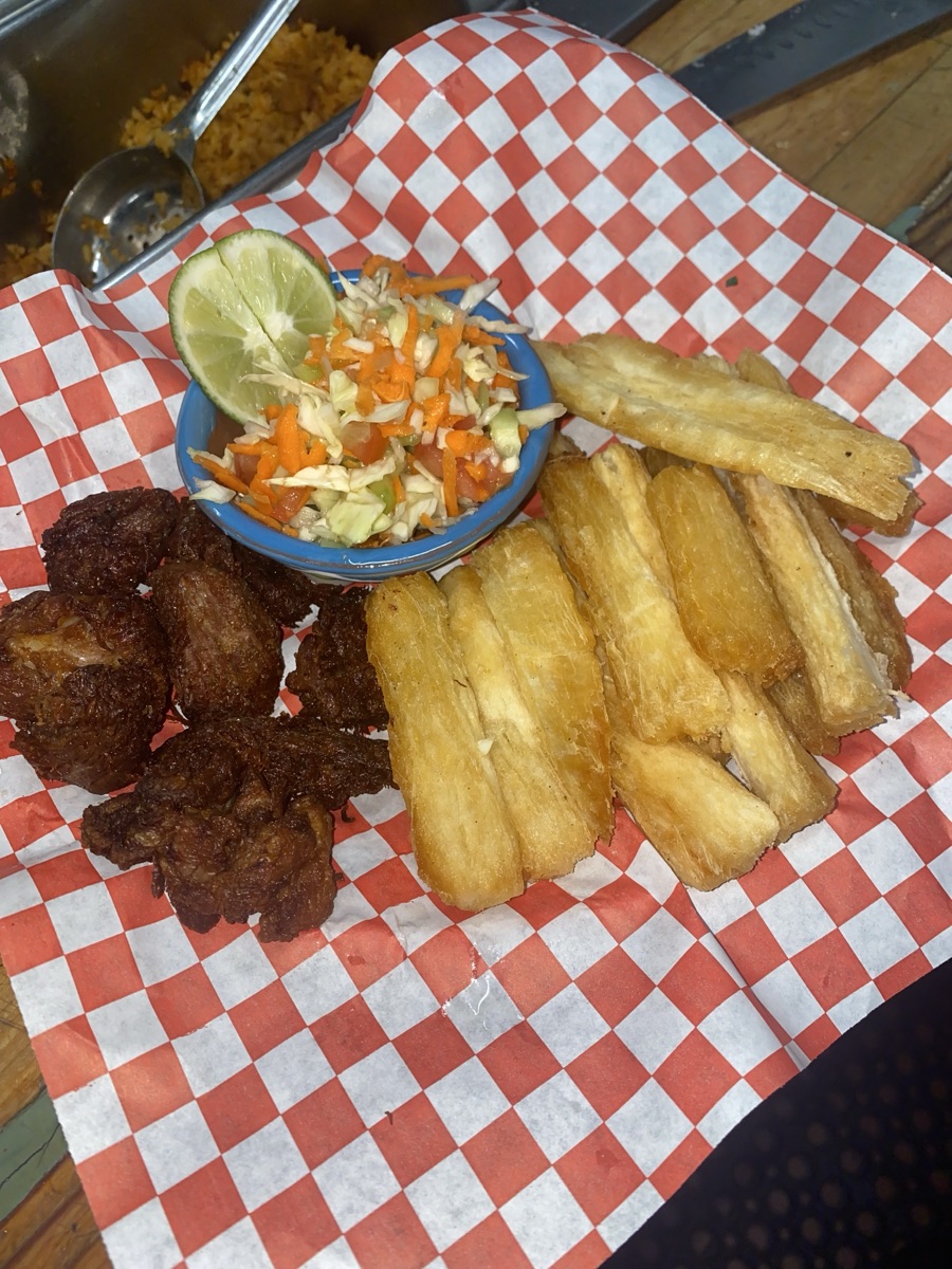 Yuca con chicharrón — golden yuca with crispy pork